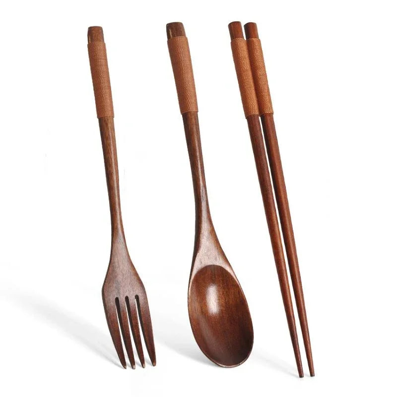 Wooden cutlery set with fork, spoon, and chopsticks featuring carved handles and natural brown wood finish for eco-friendly d