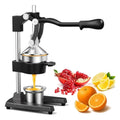 Manual cast iron citrus juicer with lever press, chrome strainer cone and stainless steel collection cup, on a white background